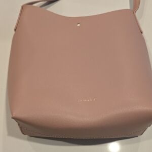 Elegant Pink Shoulder Bag with Curved Design